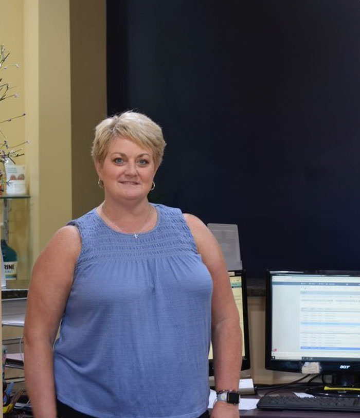 Dental team member smiling