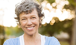 closeup of woman smiling outside