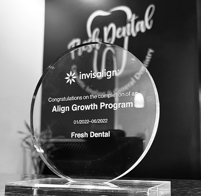 Plaque in dental office showing completion of Align Growth Program for Invisalign