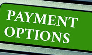 Green sign with white text that says payment options